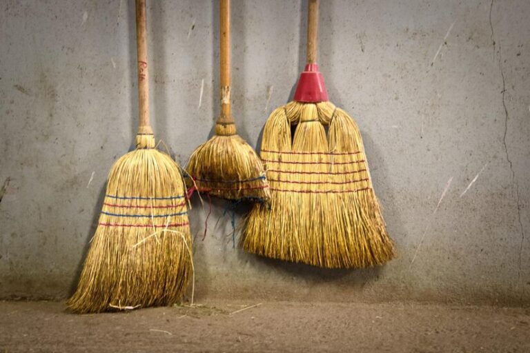 close-up-broom-hanging-wall_1048944-25935835