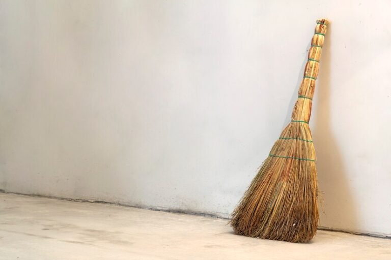 old-obsolete-broom-besom-leaning-gray-wall_127089-2366